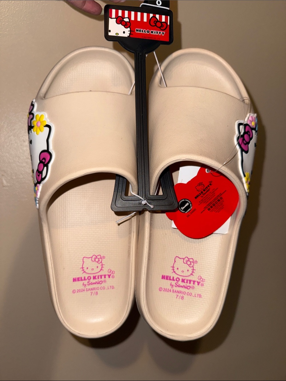 Hello Kitty Cream Slide Sandals with Pink & Yellow Accents size 7/8 women’s